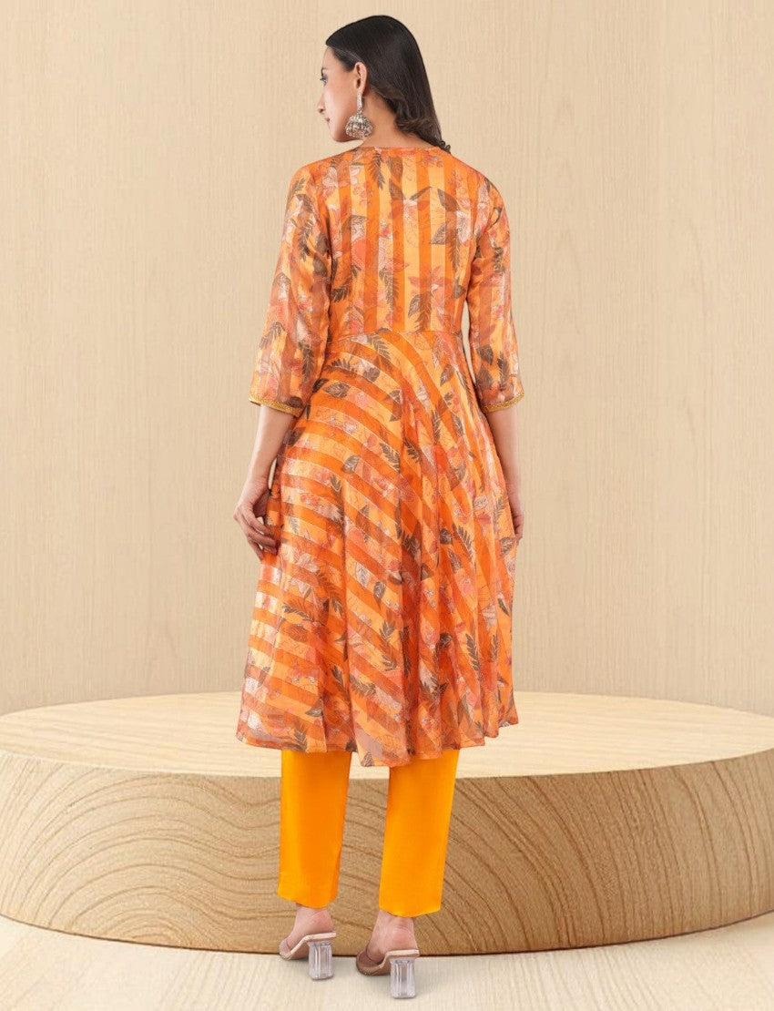 Eelika yellow chiffon calf length salwar suit with geometric print, 3/4th sleeves, and cotton trousers, back view