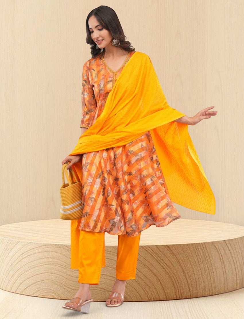 Eelika yellow chiffon calf length salwar suit with geometric print, V-neck, 3/4 sleeves, and matching dupatta.