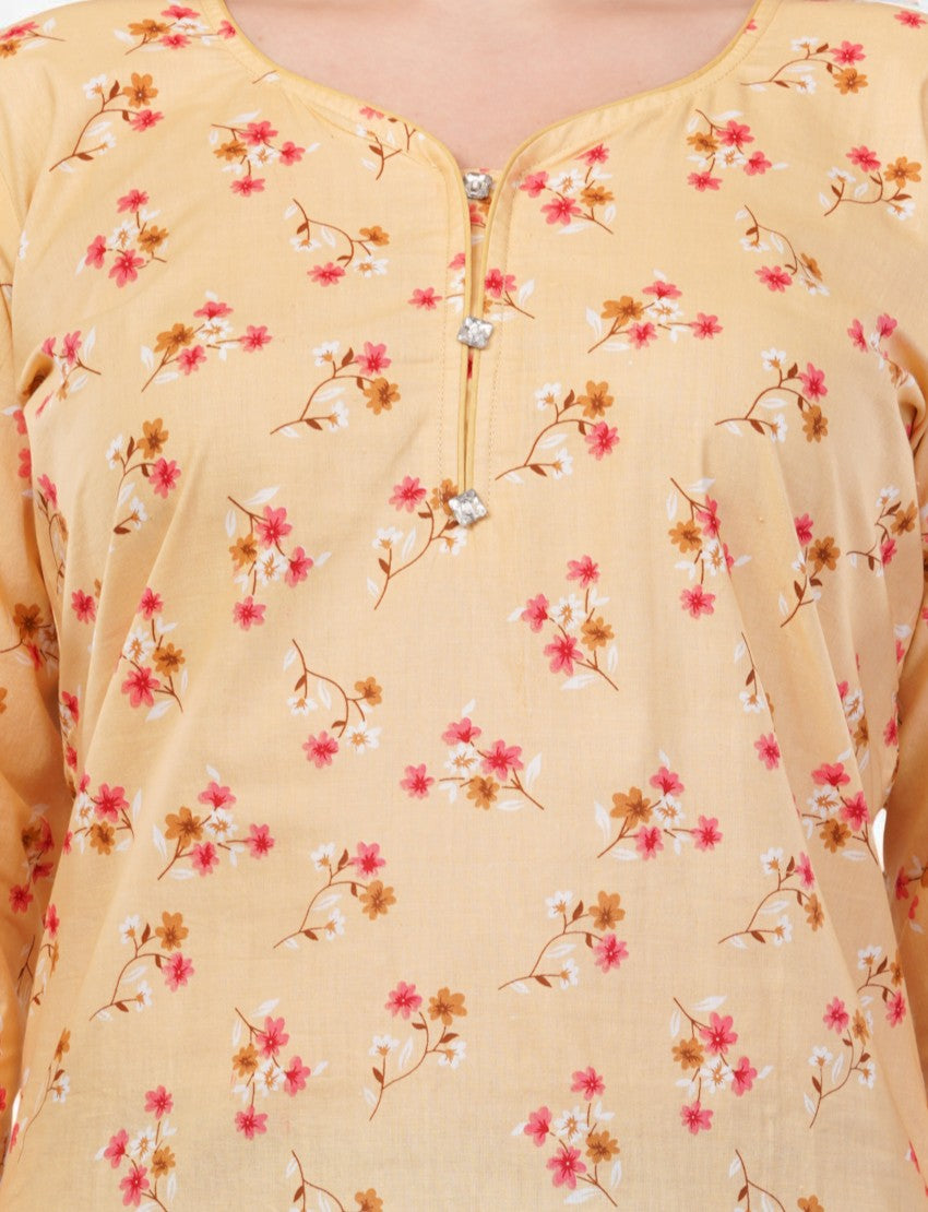 Eelika yellow cotton kurti featuring a round neck, 3/4 sleeves, and a delicate pink and brown floral print.