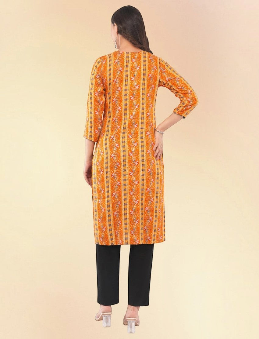 Back view of Eelika yellow printed cotton kurta with three-quarter sleeves paired with black trousers